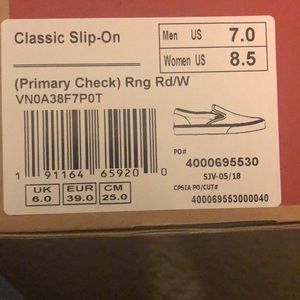 Red checkered vans slip on